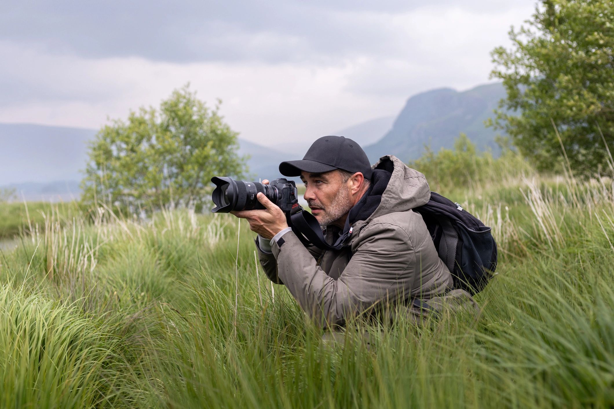 Photographer capturing images outdoors